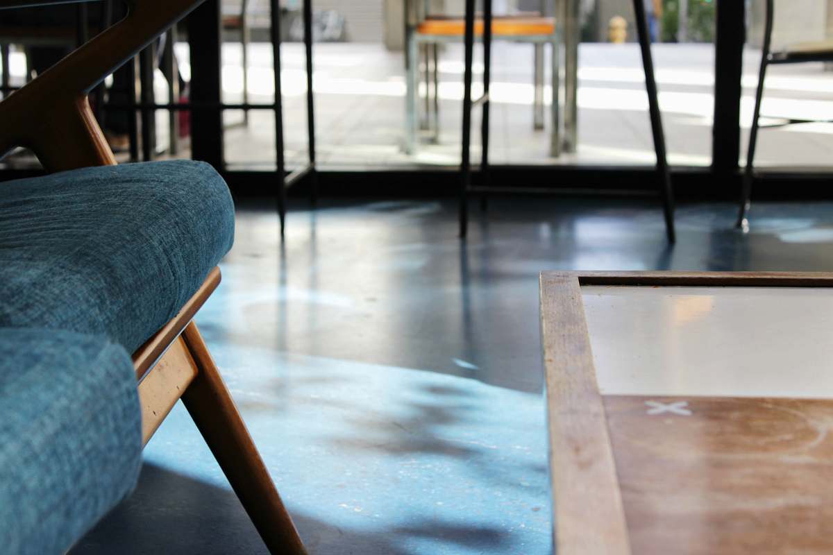 revolving door blue padded sofa table